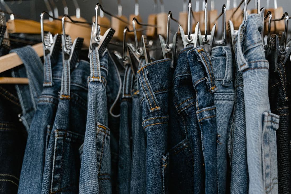 Rail of vintage straight-leg jeans in different washes