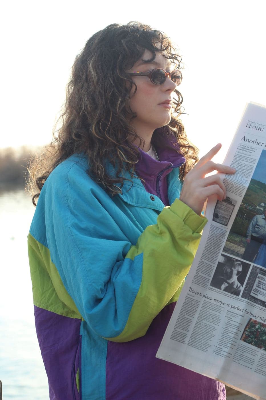 Woman in a bright 90s windbreaker